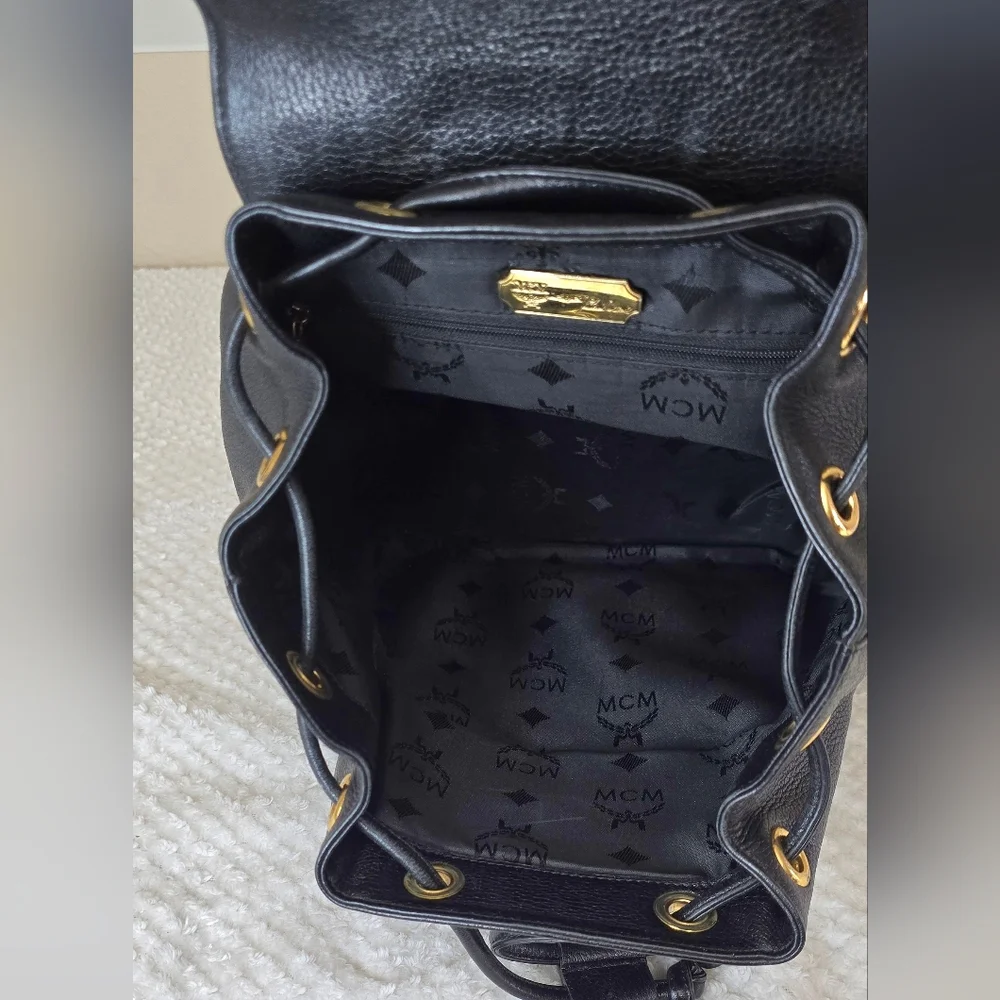 MCM Black Leather Studded Backpack Gold Hardware Drawstring Side Zip